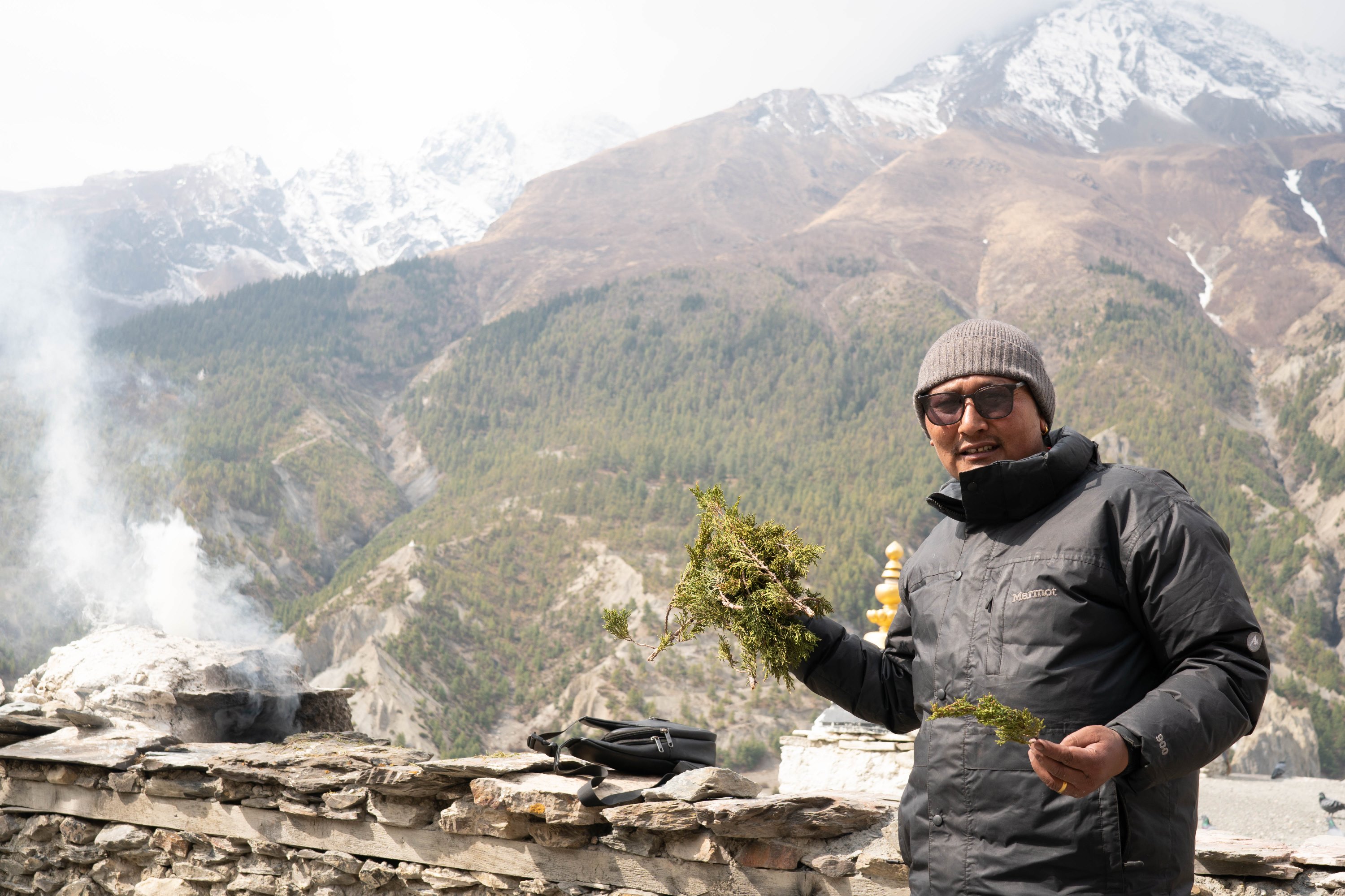 karma chiring gurung, caretaker of monastery lighting sang (junipers) (2).jpg